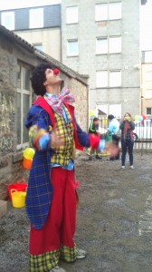 Tom preparing to be a clown for the street party!